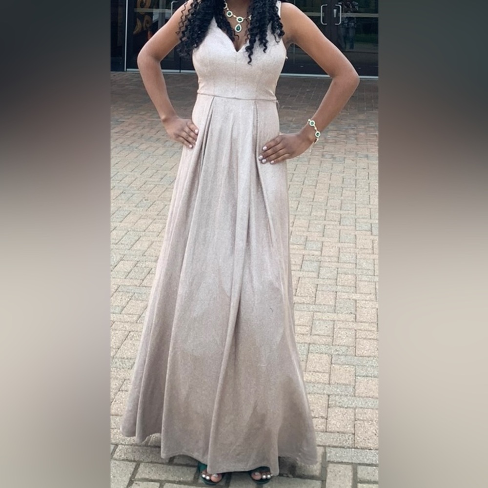 Was worn once to a ball at a high school dance and is still in great shape.